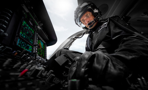Pilot Matt Wilcock in cockpit of Wiltshire Air Ambulance's helicopter Pilot Matt Wilcock in cockpit of Wiltshire Air Ambulance's helicopter