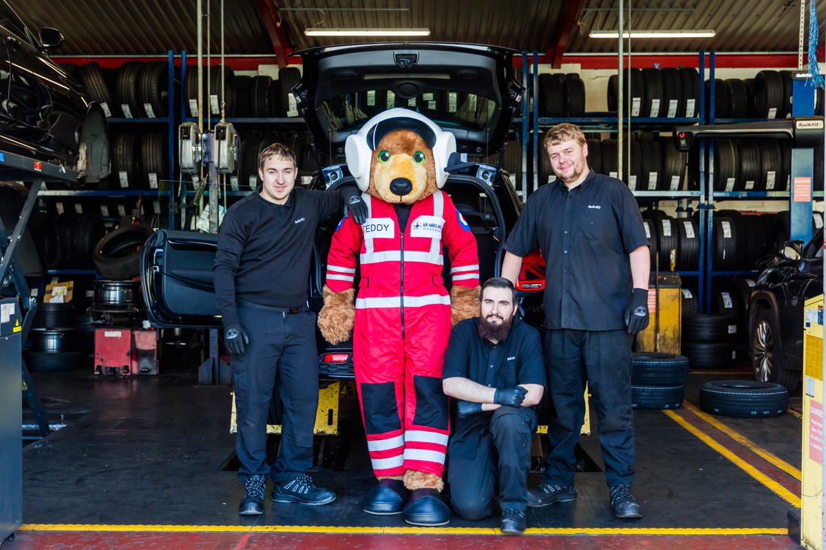 Teddy The Air Ambulances UK Mascot Joined The Kwik Fit Borehamwood Team To Mark The New Charity Partnership on Kwik Fit and Air Ambulances UK announce new national partnership Teddy The Air Ambulances UK Mascot Joined The Kwik Fit Borehamwood Team To Mark The New Charity Partnership on Kwik Fit and Air Ambulances UK announce new national partnership