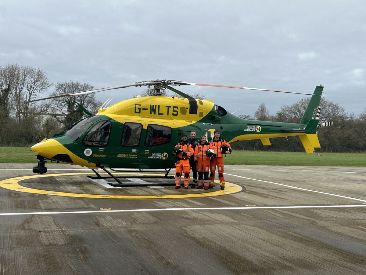 Wiltshire and Bath Air Ambulance Charity's new look helicopter, back at it's airbase in Semington, with four members of the critical care team standing beside it Wiltshire and Bath Air Ambulance Charity's new look helicopter, back at it's airbase in Semington, with four members of the critical care team standing beside it
