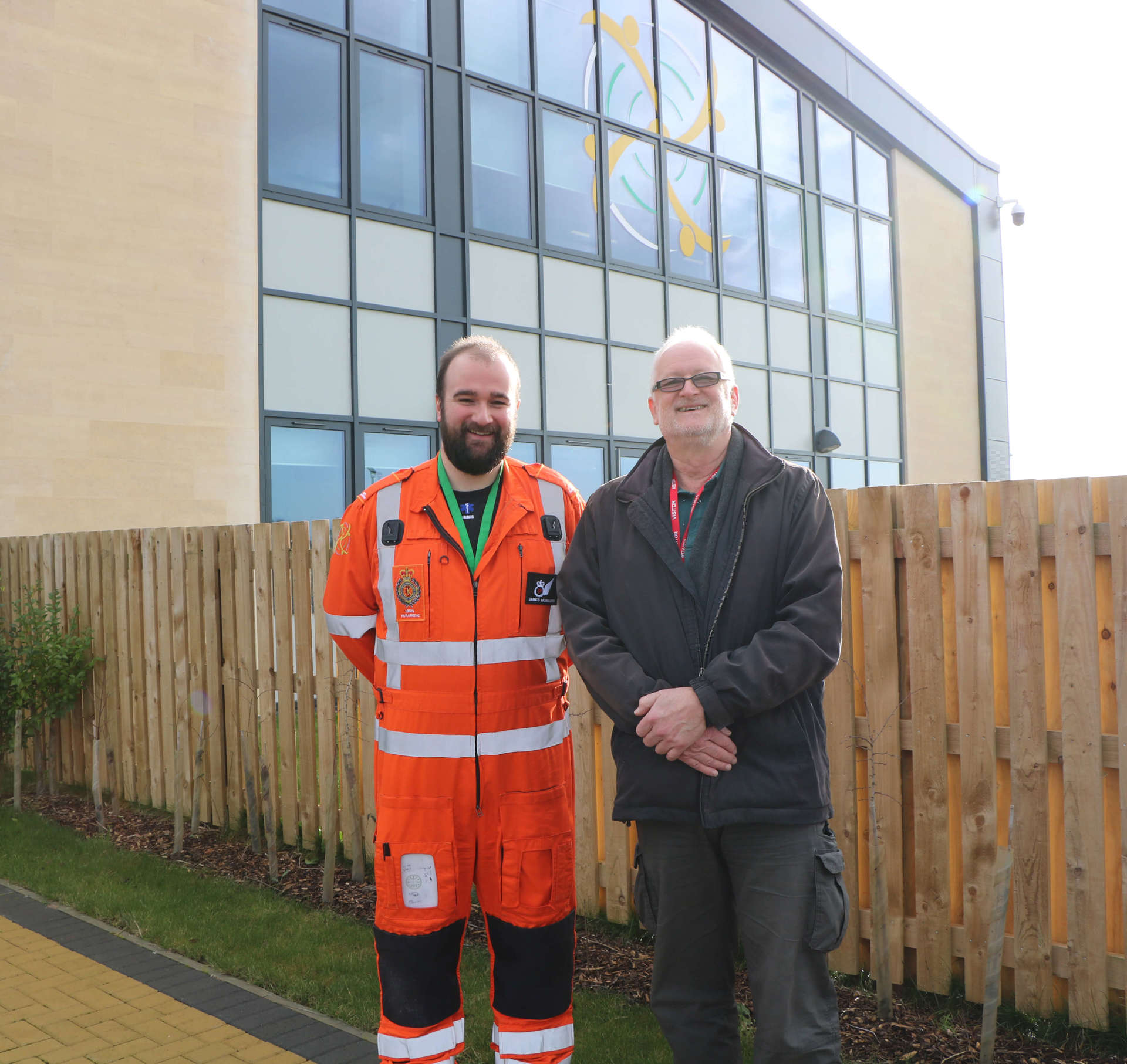 A former patient meeting a critical care paramedic outside the Wiltshire Air Ambulance airbase A former patient meeting a critical care paramedic outside the Wiltshire Air Ambulance airbase