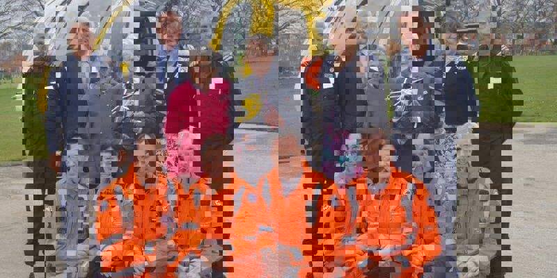 A group photo of four paramedics and two pilots suits stood in front of the MD-902 helicopter in Devizes with Dr Dick Risley Pritchard, who has been presented with a model helicopter. A group photo of four paramedics and two pilots suits stood in front of the MD-902 helicopter in Devizes with Dr Dick Risley Pritchard, who has been presented with a model helicopter.