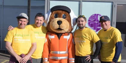 A group of staff from Excalibur with charity mascot Wilber A group of staff from Excalibur with charity mascot Wilber