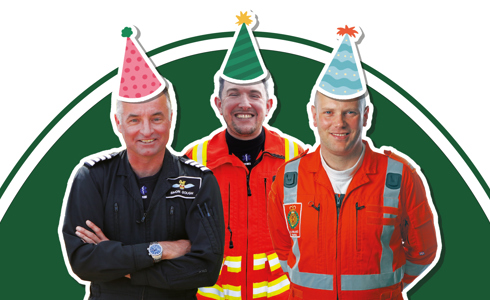 A pilot, doctor and paramedic wearing flight suits with cartoon style party hat stickers on A pilot, doctor and paramedic wearing flight suits with cartoon style party hat stickers on