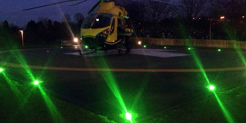 Wiltshire Air Ambulance landed on the helipad at John Radcliffe Hospital at night Wiltshire Air Ambulance landed on the helipad at John Radcliffe Hospital at night