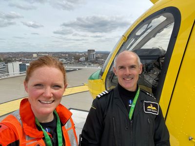Paramedic Sophie and pilot Rob taking a selfie on the BRI helipad, with Wiltshire Air Ambulance's helicopter in the background Paramedic Sophie and pilot Rob taking a selfie on the BRI helipad, with Wiltshire Air Ambulance's helicopter in the background