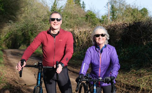 A photo of Nick and Gaynor Cole posing with bicycles A photo of Nick and Gaynor Cole posing with bicycles