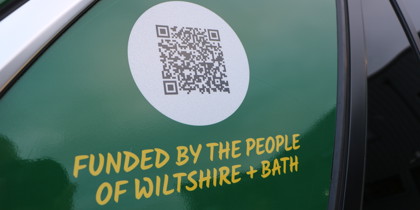 Funded By The People of Wiltshire and Bath on the side of a car