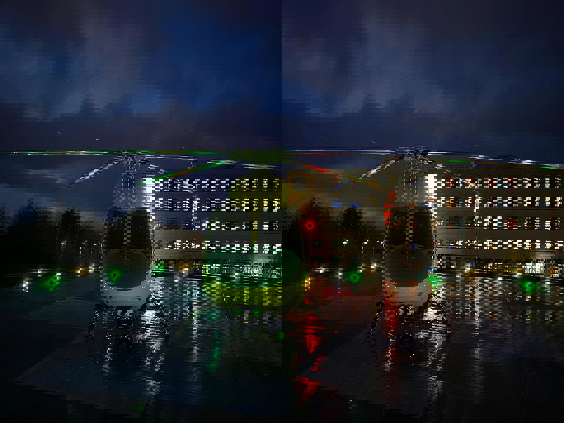 Wiltshire Air Ambulance's helicopter landed at Great Western Hospital, Swindon at night Wiltshire Air Ambulance's helicopter landed at Great Western Hospital, Swindon at night