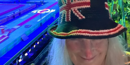 A volunteer wearing a crochet hat featuring the GB flag A volunteer wearing a crochet hat featuring the GB flag