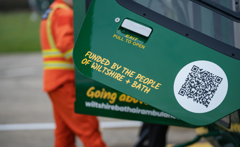 Funded by the people of Wiltshire + Bath phrase on a helicopter door