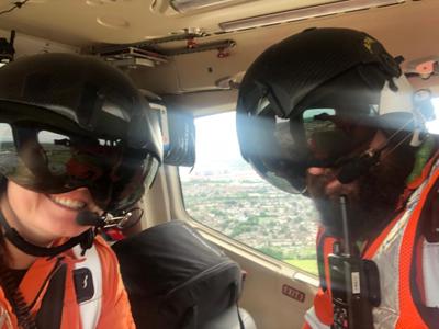 Critical care paramedics Jo Gilbert and James Hubbard take a selfie on-board the Wiltshire Air Ambulance helicopter wearing flight helmets and visors. Critical care paramedics Jo Gilbert and James Hubbard take a selfie on-board the Wiltshire Air Ambulance helicopter wearing flight helmets and visors.
