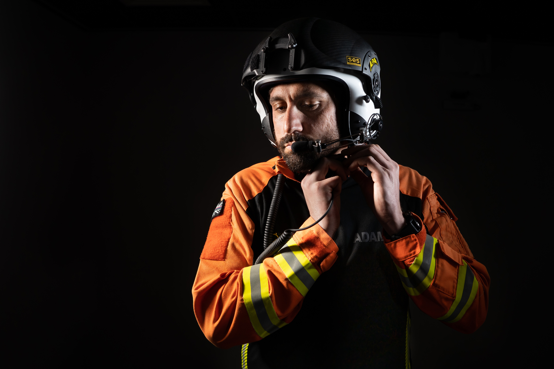 Wiltshire Air Ambulance critical care paramedic Adam Khan securing his flight helmet. Wiltshire Air Ambulance critical care paramedic Adam Khan securing his flight helmet.