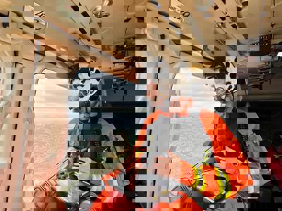 Critical care paramedic Ben Abbott admiring the view from the Wiltshire Air Ambulance helicopter. Critical care paramedic Ben Abbott admiring the view from the Wiltshire Air Ambulance helicopter.